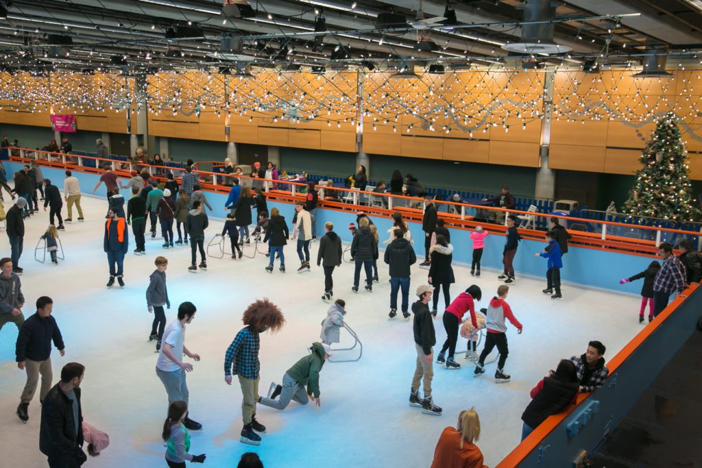 Ice skaters at Seattle Center Winterfest near Denny Avenue