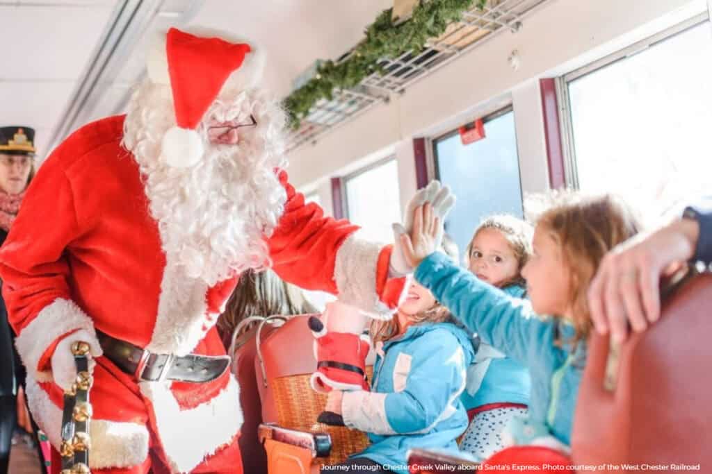Kids meeting Santa on Washington Christmas Train Ride 2025