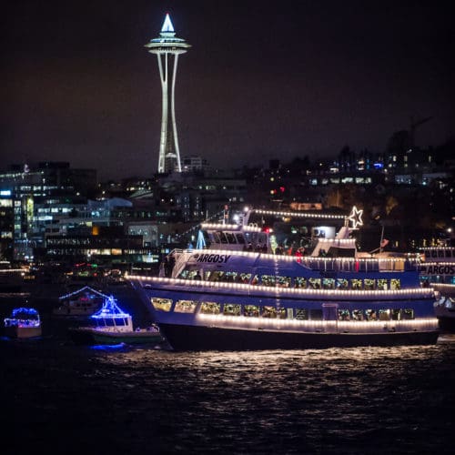 Argosy Christmas Ship Festival 2025 in Seattle featuring choir performances and decorated boats