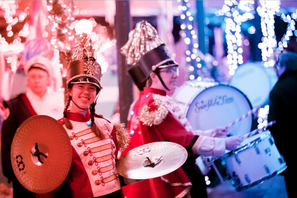 Bellevue Snowflake Lane 2025 parade with dancers and drummers - Washington Christmas Events 2025: The Best Holiday Celebrations in Washington State