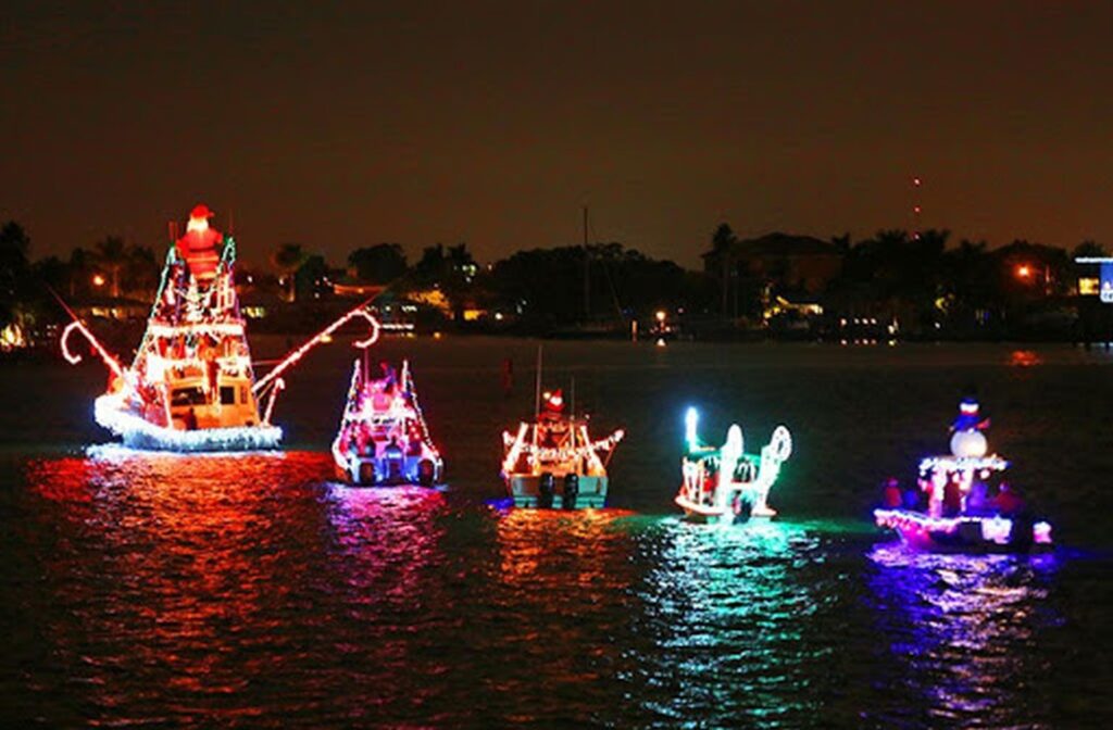 Holiday boats decorated with lights during the Seattle Christmas Ship Festival.